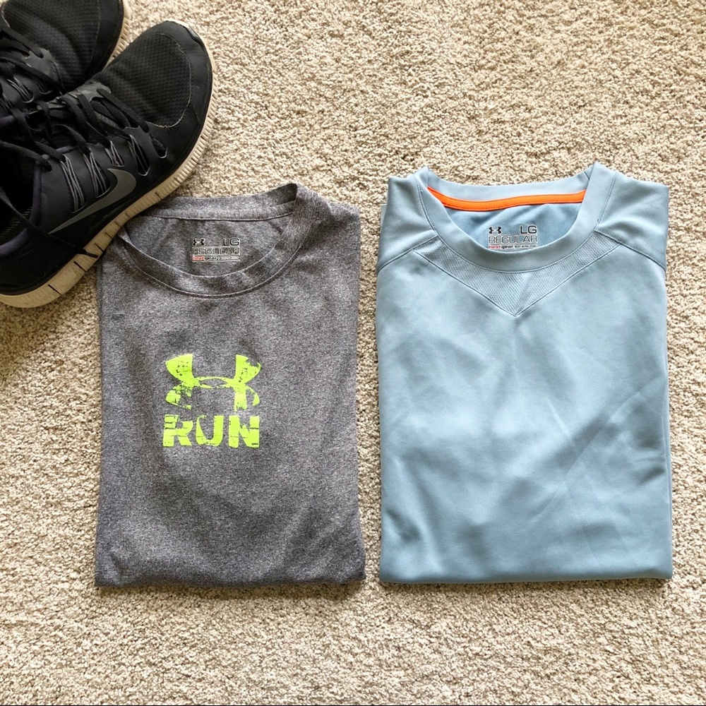 2 men’s Under Armour heat gear short sleeve shirts